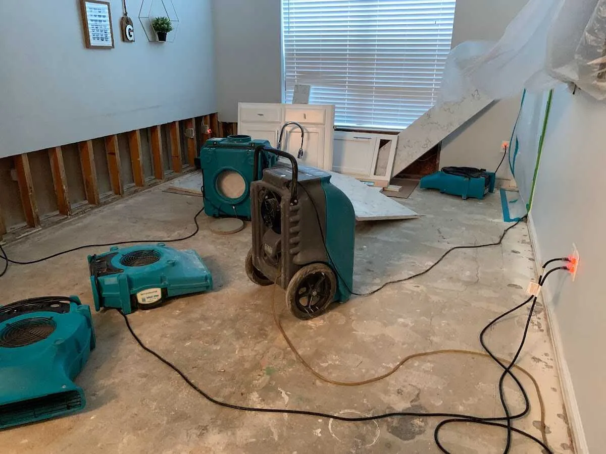 Dehumidifier in flood-cut room for Water Damage Restoration in Superior